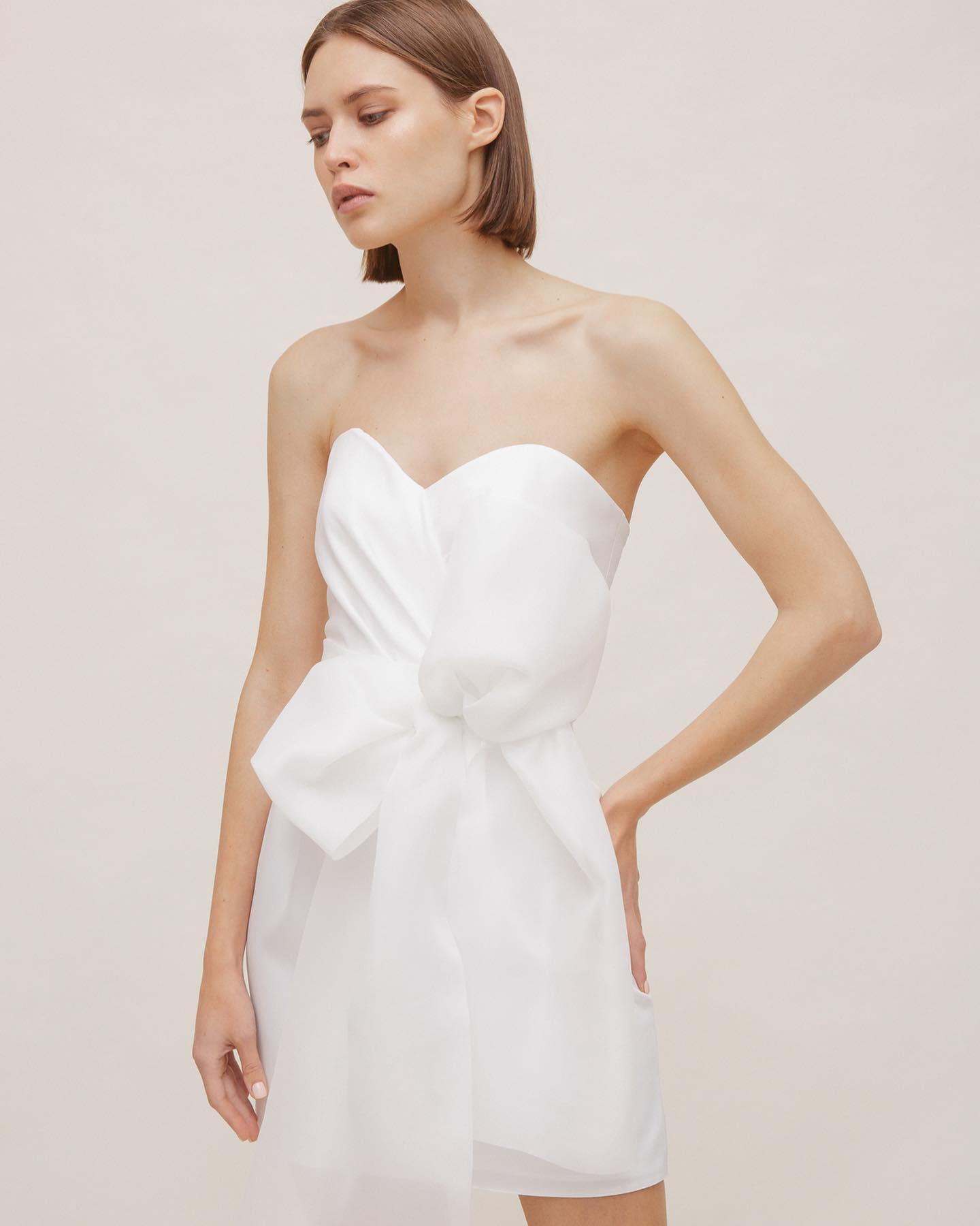 Corset dress with an organza bow