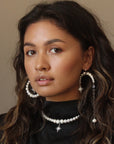 ASYMMETRICAL PEARLS EARRINGS WITH “MORNING STAR”