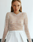 Semi-sheer lace blouse